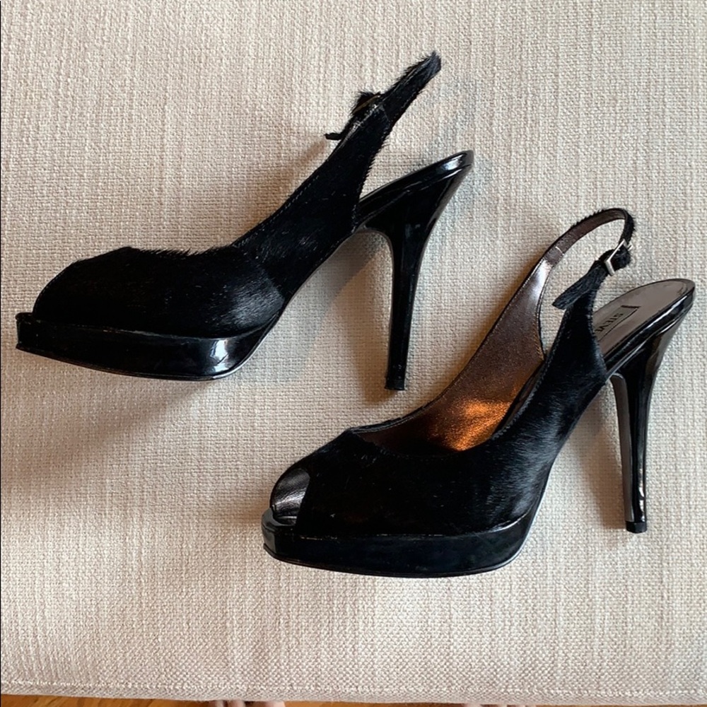Platforms are back!! Super fun Steve Madden Pony hair, peep toe, platform.